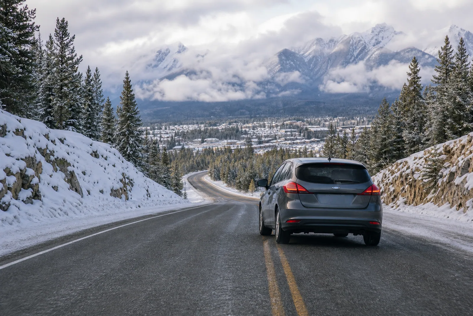 A car travelling safely on a Canadian winter road